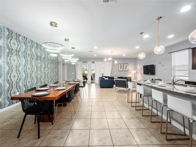 dining area with light tile patterned floors