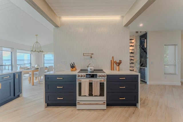 kitchen with lofted ceiling, white electric range, decorative light fixtures, a chandelier, and light hardwood / wood-style flooring