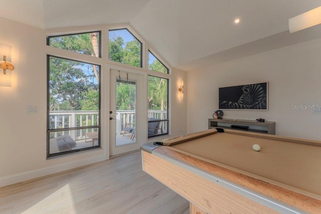 rec room with lofted ceiling, light hardwood / wood-style flooring, and billiards