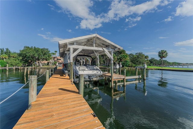 dock area featuring a water view