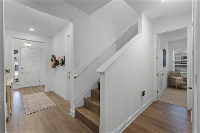 entrance foyer featuring hardwood / wood-style floors