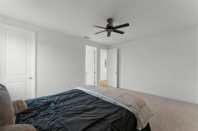 carpeted bedroom with ceiling fan