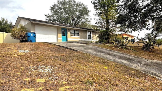 single story home with a garage