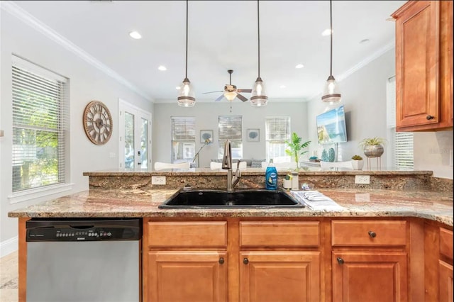 kitchen with a sink, hanging light fixtures, ornamental molding, stainless steel dishwasher, and brown cabinets