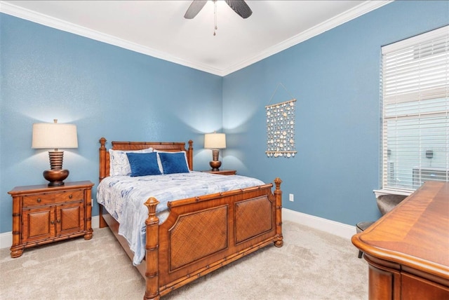 bedroom featuring light carpet, ceiling fan, baseboards, and crown molding