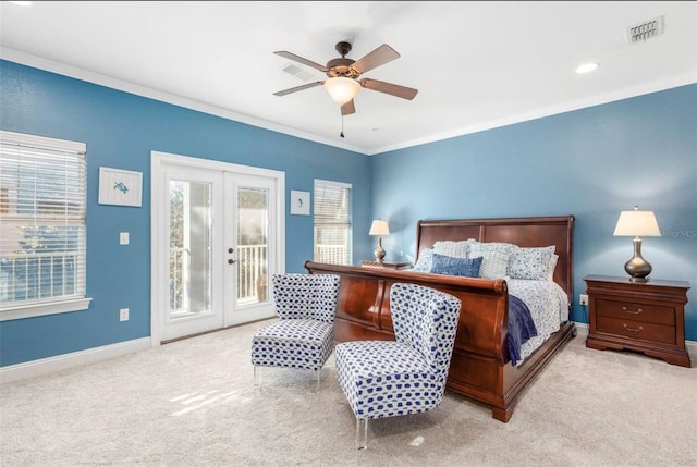 bedroom with light carpet, visible vents, ornamental molding, access to outside, and french doors