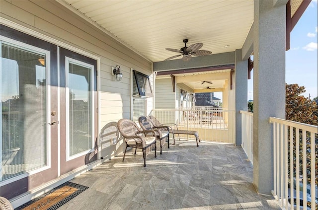 view of patio featuring ceiling fan