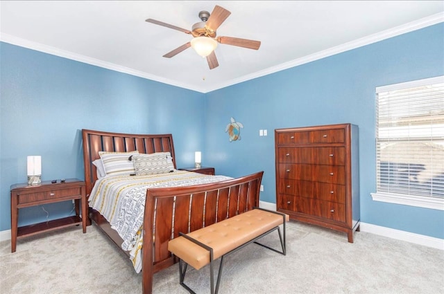 bedroom with light carpet, crown molding, baseboards, and ceiling fan