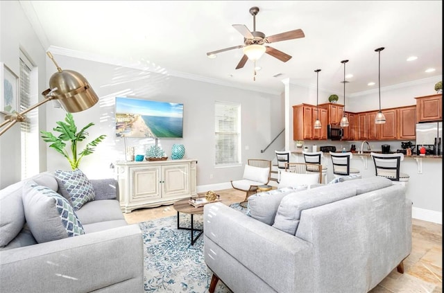 living room with a ceiling fan, baseboards, crown molding, and recessed lighting