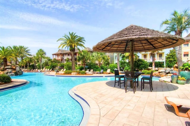 pool with a patio