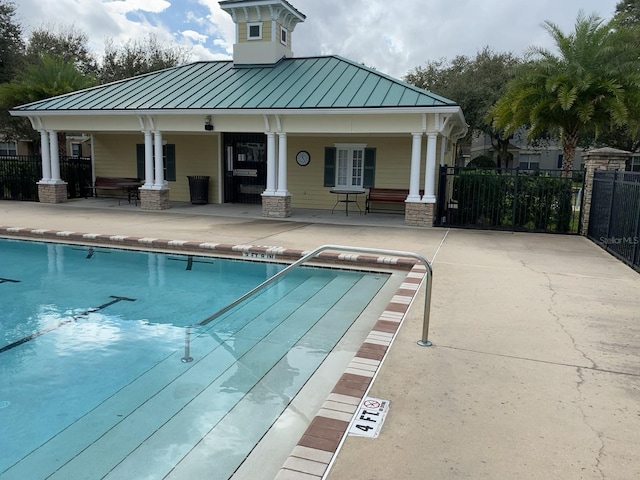 view of pool featuring a patio area