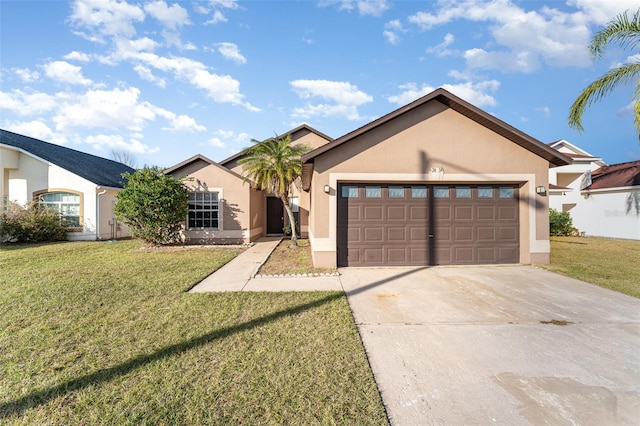 ranch-style home with a garage and a front yard