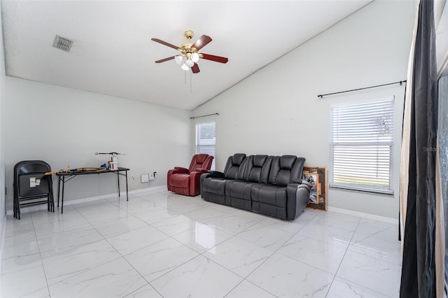 living room with vaulted ceiling and ceiling fan