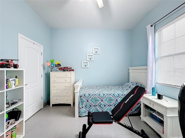 bedroom featuring ceiling fan