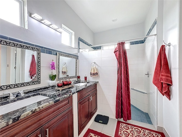 bathroom featuring vanity, tile patterned floors, and a shower with shower curtain