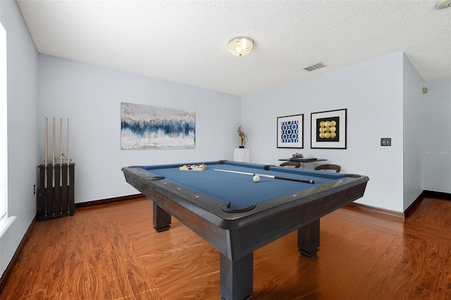 playroom with hardwood / wood-style floors, billiards, and a textured ceiling