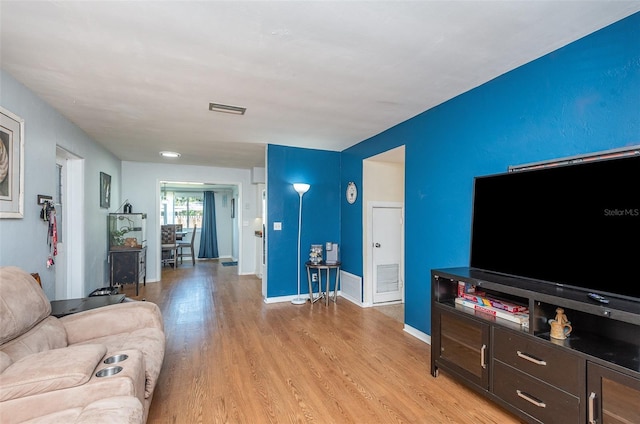 living room featuring light wood-type flooring