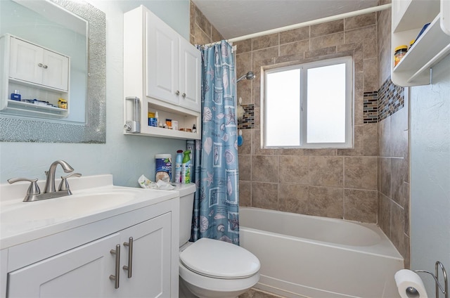 full bathroom with shower / tub combo, vanity, and toilet