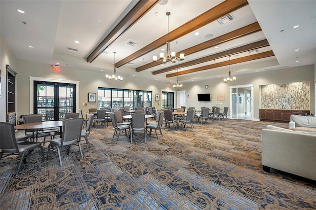 dining space featuring an inviting chandelier, french doors, beamed ceiling, and dark colored carpet