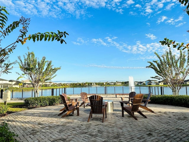 view of patio featuring a water view