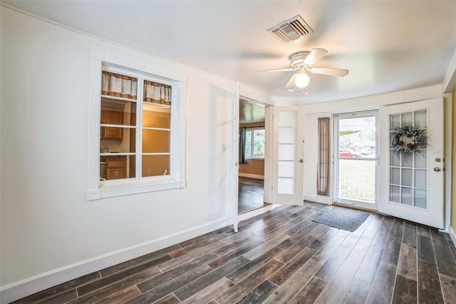 entryway with ceiling fan and dark hardwood / wood-style floors