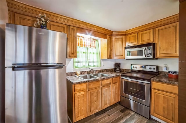 kitchen with sink and appliances with stainless steel finishes