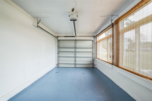 garage featuring a garage door opener