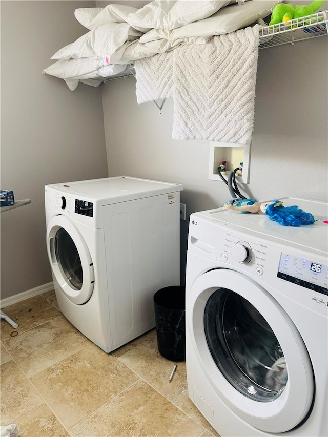 laundry room featuring washer and dryer