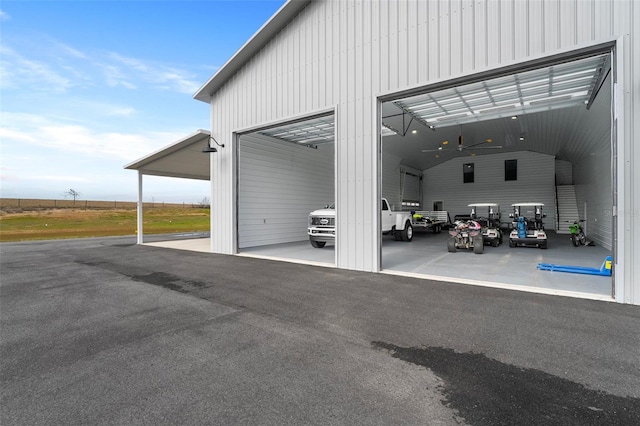 garage featuring a carport