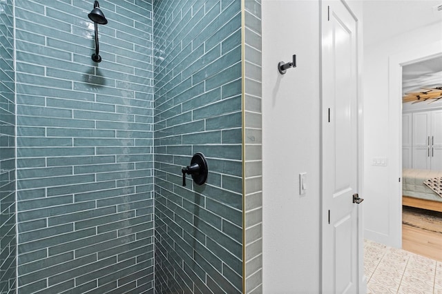 bathroom featuring tiled shower