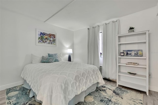 bedroom featuring light hardwood / wood-style floors