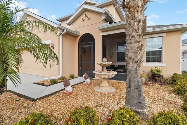 property entrance with a garage