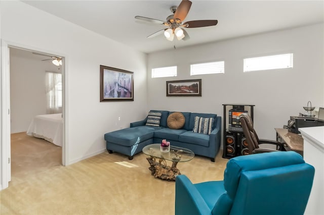 living room featuring light colored carpet and ceiling fan