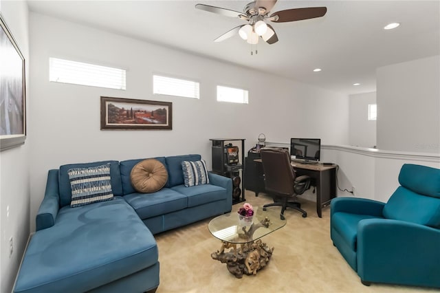 interior space featuring ceiling fan and a healthy amount of sunlight