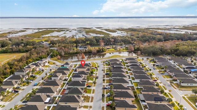 drone / aerial view with a water view