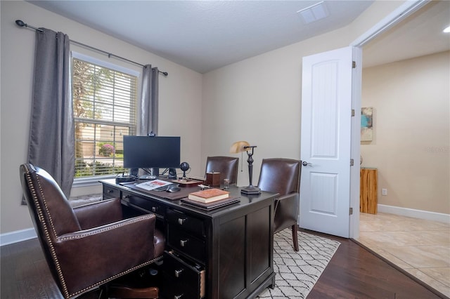 home office featuring hardwood / wood-style floors