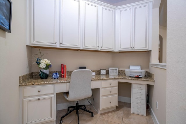 tiled office space with built in desk