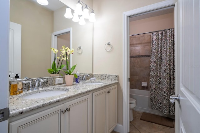 full bathroom with tile patterned flooring, vanity, toilet, shower / bathtub combination with curtain, and an inviting chandelier