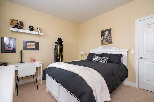 bedroom with light carpet