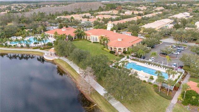 drone / aerial view with a water view