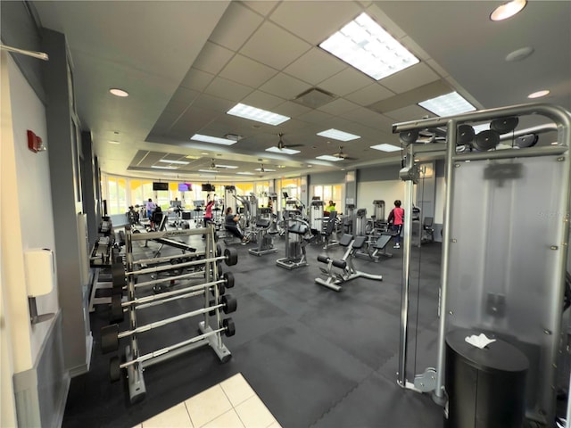 workout area featuring a drop ceiling