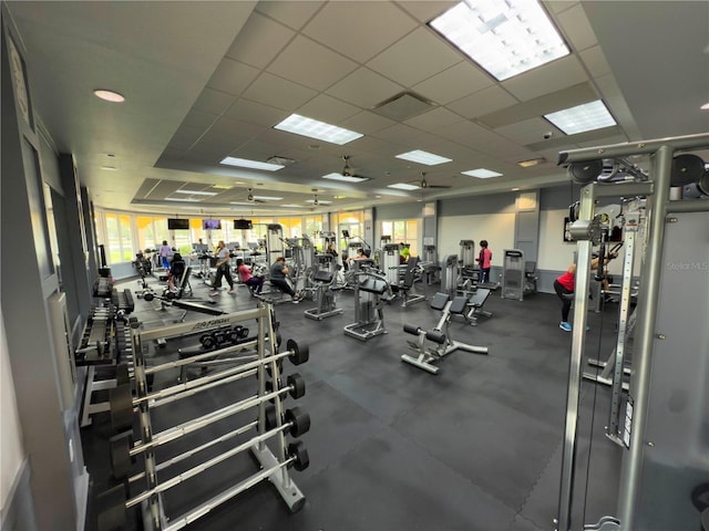 workout area featuring a paneled ceiling