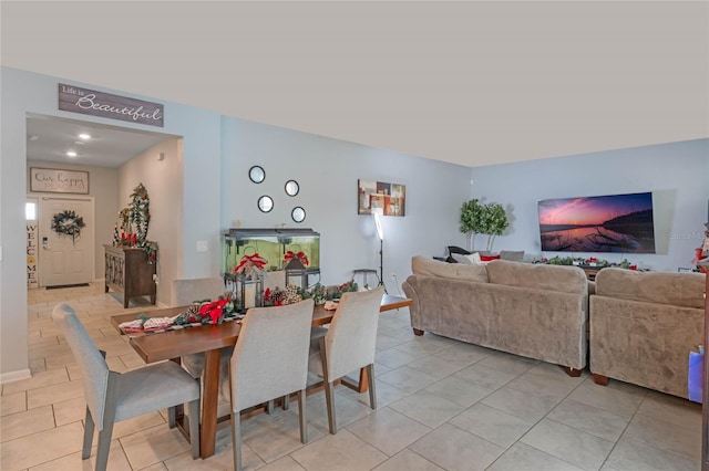 dining room featuring light tile patterned floors