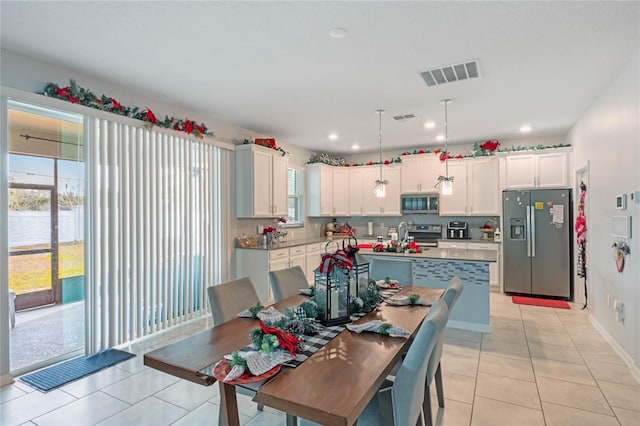 view of tiled dining space