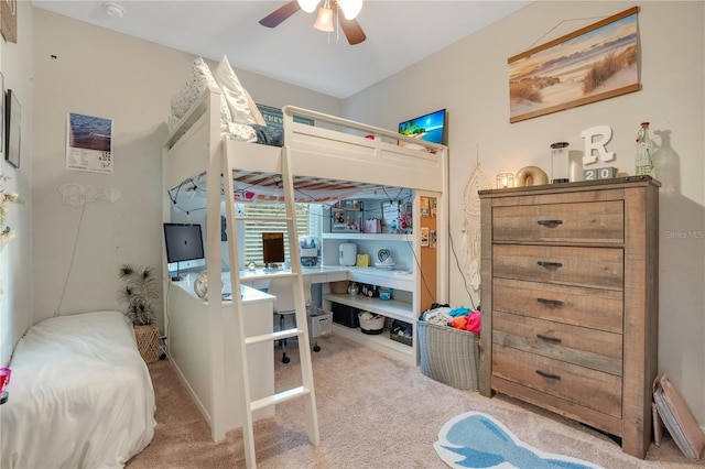 bedroom featuring light colored carpet and ceiling fan