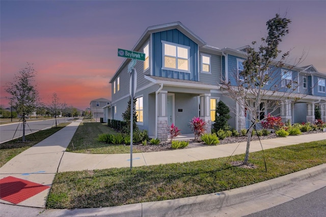 view of front of home with a lawn