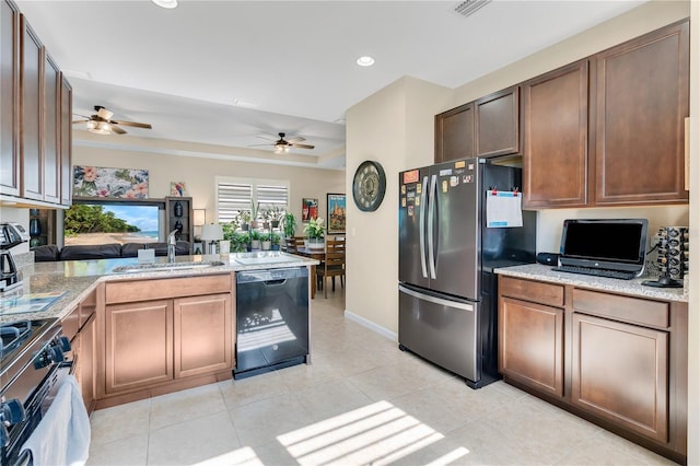 kitchen with dishwasher, sink, stainless steel fridge, range, and kitchen peninsula