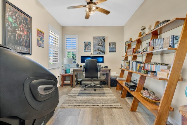 office area with ceiling fan and light wood-type flooring