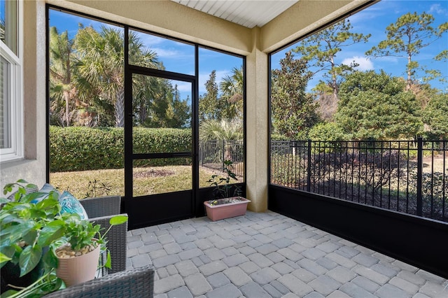 unfurnished sunroom with a healthy amount of sunlight