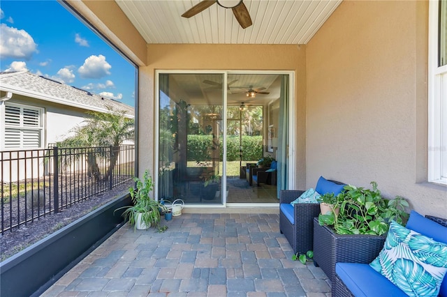 view of patio / terrace featuring ceiling fan